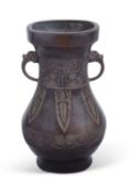 Chinese bronze vase Hu in archaistic style, probably Qing dynasty with formal Ming style lappetts