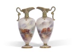 Pair of Royal Worcester ewers decorated with cattle in Highland scene decorated by H Stinton the