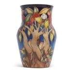 A Moorcroft trial vase with tube lined decoration in the Aquitaine pattern marked Trial and dated