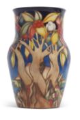 A Moorcroft trial vase with tube lined decoration in the Aquitaine pattern marked Trial and dated