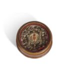 WWI reliquary in the form of a boxwood circular box with screw on lid (crack to lid) opening to