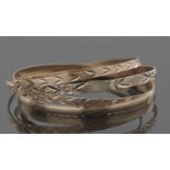 Three hallmarked 9ct gold bangles, and one stamped 9kt, 23.7gms