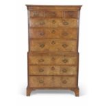 Georgian walnut veneered chest on chest with moulded cornice over three short and six long drawers