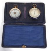First quarter of 20th century pocket watch compass along with a pocket barometer in fitted blue