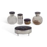 Matched five-piece silver encased/mounted and tortoiseshell lidded dressing table set comprising two