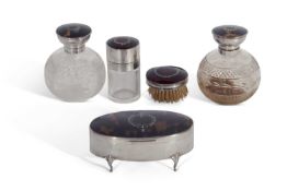 Matched five-piece silver encased/mounted and tortoiseshell lidded dressing table set comprising two