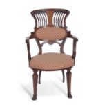 Late 19th/early 20th century mahogany and inlaid armchair with pierced back, arms with scrolled