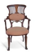 Late 19th/early 20th century mahogany and inlaid armchair with pierced back, arms with scrolled