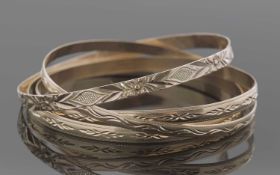 Three hallmarked 9ct gold bangles and one stamped 9kt, 26.3gms