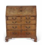 18th century walnut veneered bureau of typical form, the full front opening to an interior of