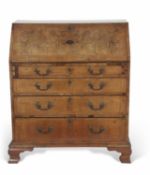 18th century walnut veneered bureau of typical form, the full front opening to an interior of