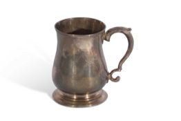 George II half pint tankard of typical plain baluster form with double 'C' scrolled handle and