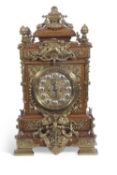 A large and impressive late 19th century French mantel clock with brass and silvered dial with