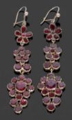 Pair of vintage Bohemian style garnet pendant earrings of floral cluster design with enclosed