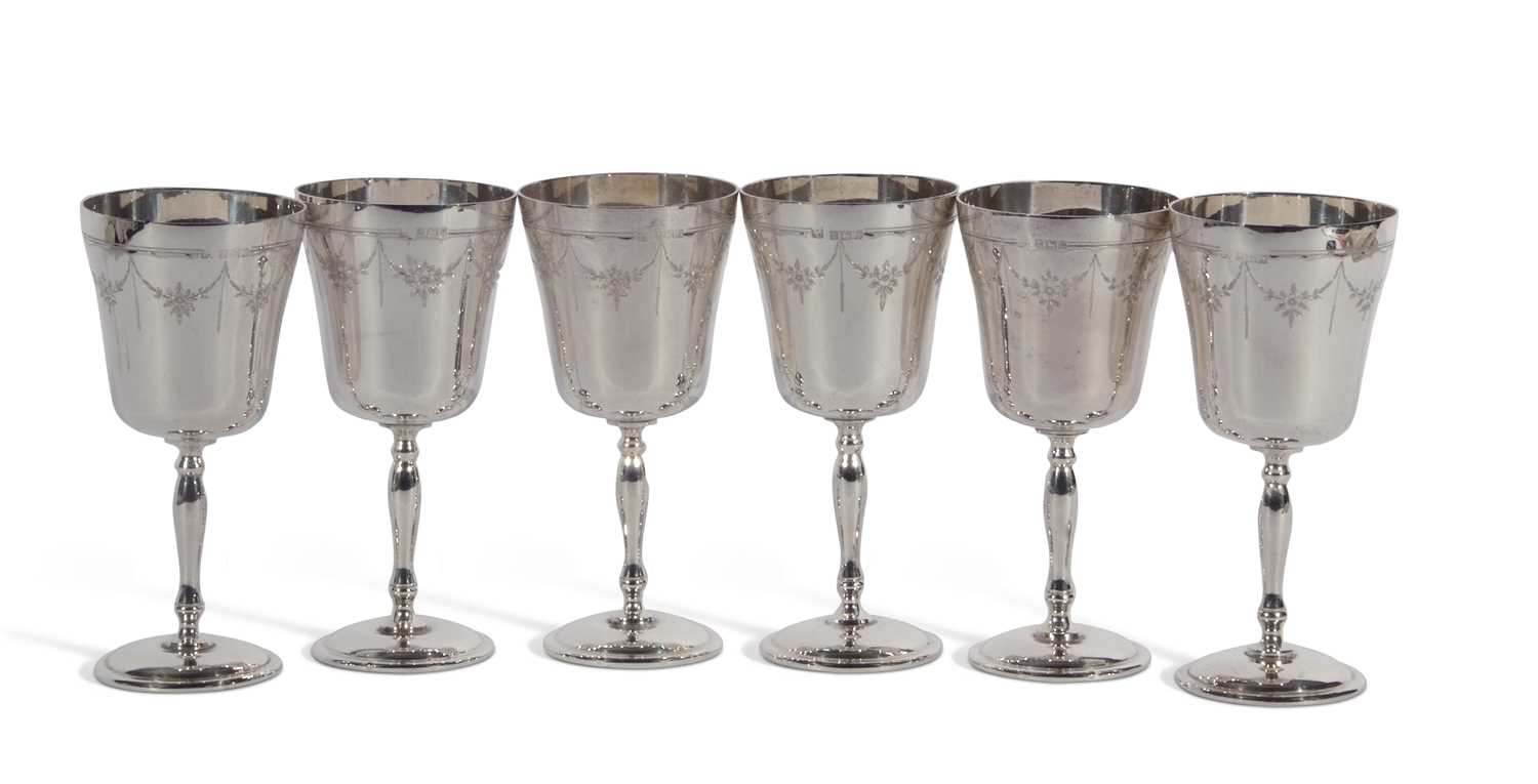 Set of six Elizabeth II goblets. The inverted bell shaped tops with floral and foliate engraved