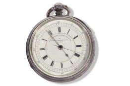 Large silver open face pocket watch with white enamel dial and black Roman numeral hour markers, key