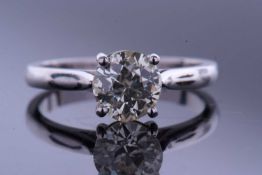 Single stone diamond ring, the round brilliant cut diamond approx 1ct total, raised between