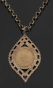 Victorian sovereign dated 1891, in an ornate pierced lozenge shaped pendant mount, suspended from