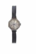 Ladies wrist watch featuring a white metal dial with contrasting black hands and Arabic numerals,