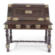 Large 19th century Ceylonese trunk on stand, top section with fall down front containing 8 small
