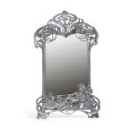 A large W.M.F style silver plated dressing table mirror in the Art Nouveau style, the strut back