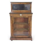 Victorian Rosewood veneered pier cabinet with mirrored back over a body with single glazed door