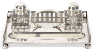 W.M.F. silver plated ink stand of rectangular form with pierced gallery surround, having two inset