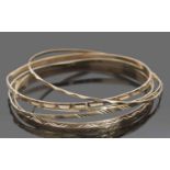 Five 9ct gold bangles with engraved detail, (non-matching), 14.9gms