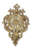 Late 19th/early 20th century French cartel type wall clock, central circular pressed brass and