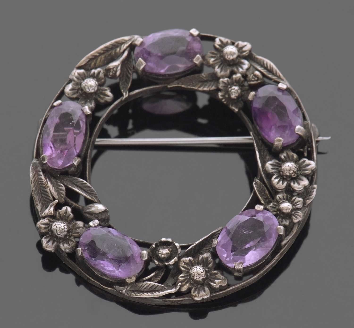 Attributed to Sybil Dunlop, Arts & Crafts garland brooch, the open work design with 5 oval faceted