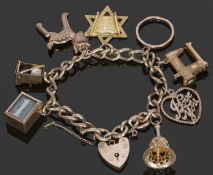 9ct gold curb link bracelet suspending various charms to include a Star of David, stamped 750, and 5