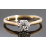 Single stone diamond ring, the old cut diamond 0.040ct approx, raised between upswept shoulders,
