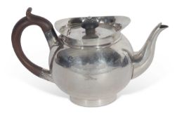 Georgian bullet teapot with raised apron, tureen handle and finial, 12.5cm tall, 20cm max-width,