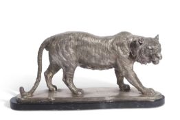 20th Century cast metal model of a male Tiger set on a polished stone base 49cm