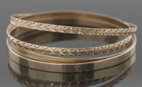 Four 9ct gold hallmarked bangles, 29.5gms