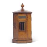 Unusual late 19th century octagonal travelling stationery/writing cabinet with hinged door opening