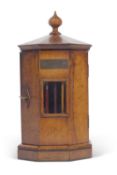 Unusual late 19th century octagonal travelling stationery/writing cabinet with hinged door opening