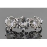 Three stone diamond ring featuring three round old European cut diamonds, calculated weight approx