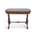 Victorian walnut veneered and inlaid card table with folding and revolving top raised on four