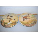 Pair of Bossons plaster wall plaques, both decorated with pheasants and ducks in relief, 36cm