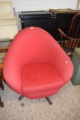 RETRO MID-CENTURY RED UPHOLSTERED REVOLVING ARMCHAIR ON FOUR FOOTED BASE, 80CM WIDE