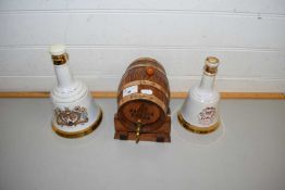 TWO ROYAL COMMEMORATIVE WADE WHISKY BELLS (WITH CONTENTS), TOGETHER WITH A MINIATURE OAK COGNAC