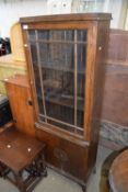 EARLY 20TH CENTURY OAK BOOKCASE OR DISPLAY CABINET WITH GLAZED TOP DOOR, 152CM WIDE