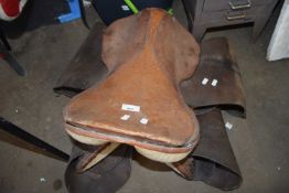 TWO VINTAGE BROWN LEATHER SADDLES