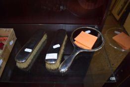 THREE PIECE DRESSING TABLE SILVER BACKED BRUSH AND MIRROR SET WITH PLANISHED DESIGN, HALLMARKED
