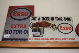 Two thin metal signs 'Esso'