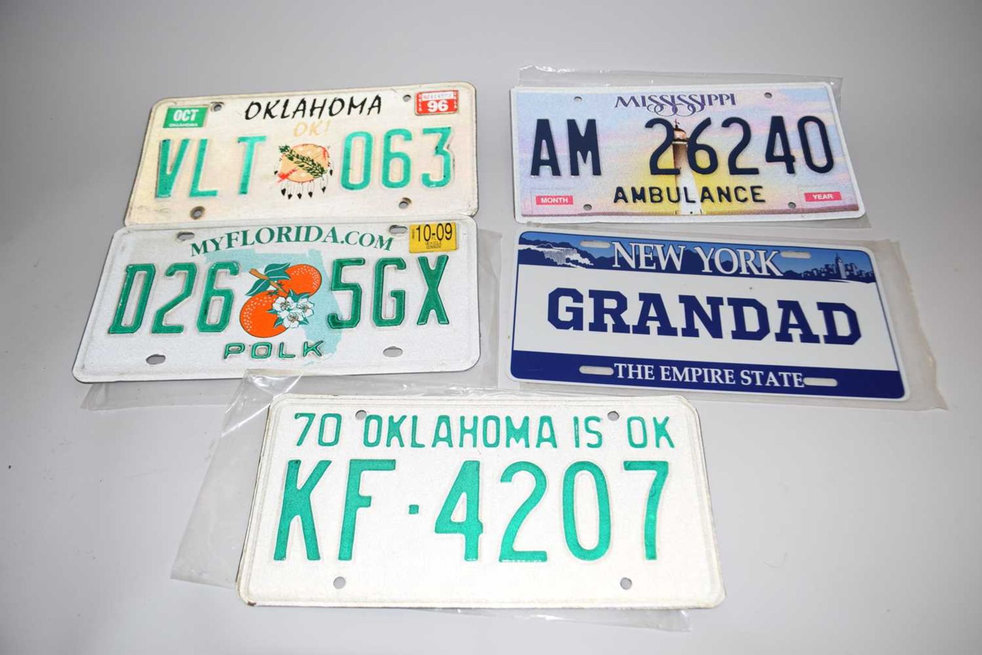 Collection of five American number plates