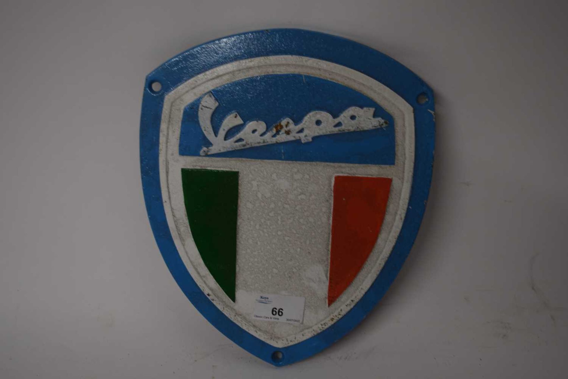 Shield shaped cast iron advertising sign 'Vespa'