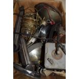 Box of various vintage car spares to include assorted Lucas head lamps, and other items