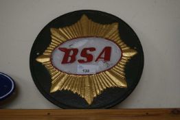 Circular cast iron wall plaque 'BSA'